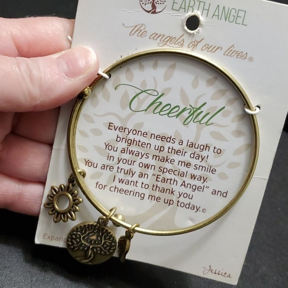 Earth Angel gold tone cheerful bracelet